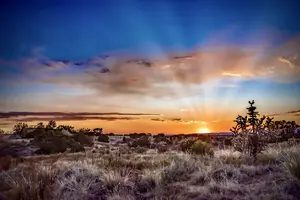 Sunrise over the Sangre de Cristo Mountains accentuates Taos as a healing sanctuary.
