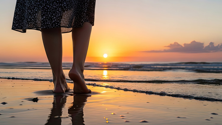 Womans legs walking along seashone grounding and earthing at the beach. Womans legs walking along seashone grounding and earthing at the beach.