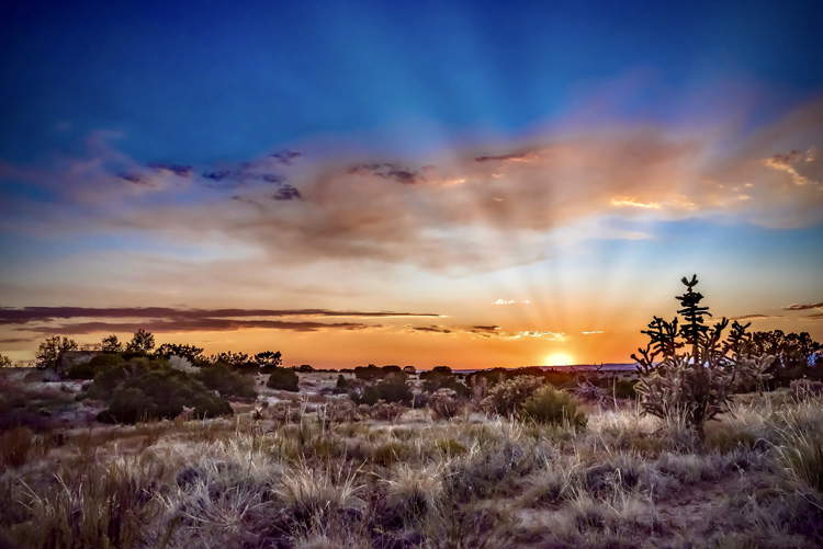 Sunrise over the Sangre de Cristo Mountains accentuates Taos as a healing sanctuary.