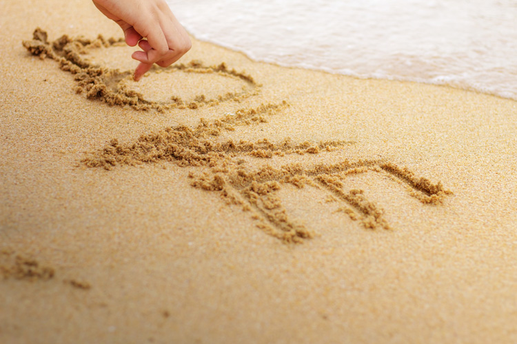 A simple beach ritual for emotional healking is tracing positive words in the sand and reflecting upon them. A simple beach ritual for emotional healking is tracing positive words in the sand and reflecting upon them.