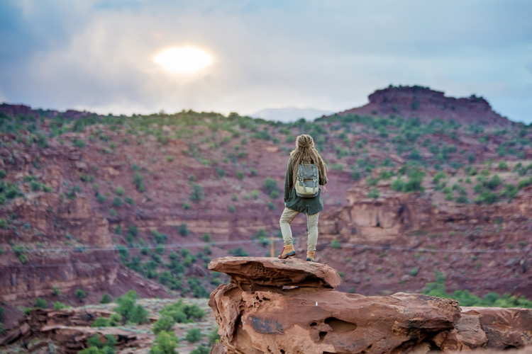Young woman overlooks the Rio Grande Gorge near Taos New Mexico. Young woman overlooks the Rio Grande Gorge near Taos New Mexico.