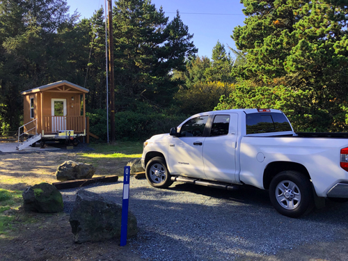 My 2018 Tundra parked in front of one of the portable cabins you can rent at Barview Jetty Park campground.