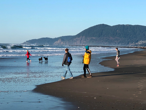 Families love bringing their children and dogs to Rockaway Beach on Thanksgiving Day.