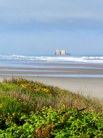 View of Twin Rocks from Manhattan Baech State Park.