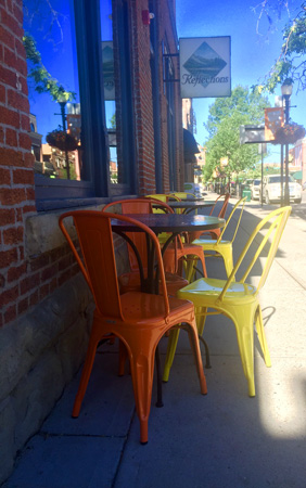 Colorful chairs on a quiet morning on Main Street in Bozeman Montana.