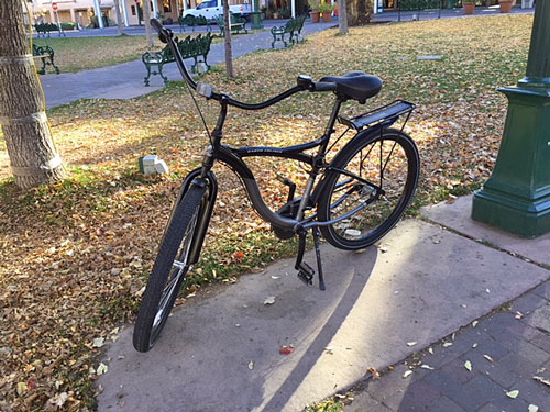 Some people bike to Santa Fe Plaza to enjoy the peaceful mornings.