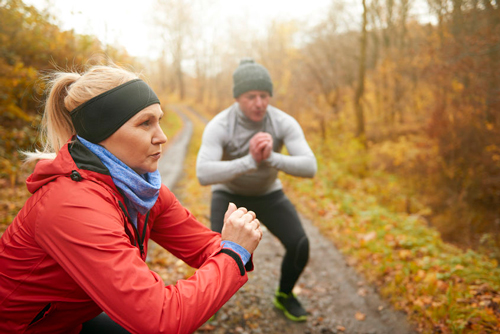 Doing squats is an excellent strengthening exercise on your morning walk.