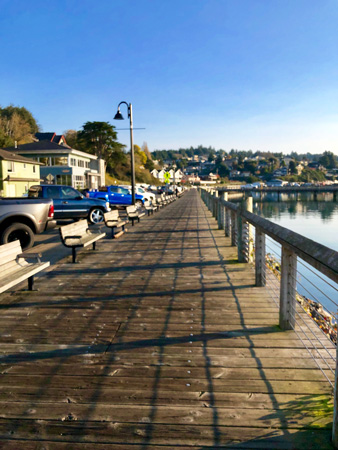 Benches line the boundary of Newport Harbor. They provide a quiet and scenic place to observe, give thanks, or pray.