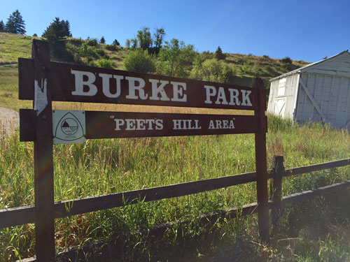Entrance sign to Burke Park/Peet's Hill from Church Street in Bozeman MT.
