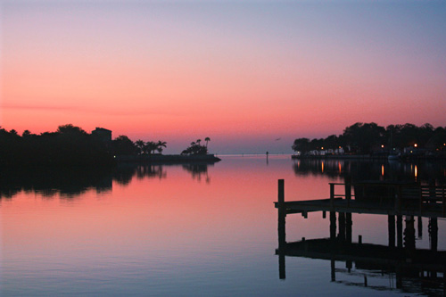 A beautiful January sunrise over Coffee Pot Basin in the historic Old Northeast section of downtown St Petersburg FL.