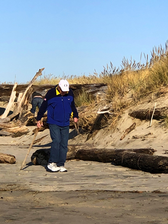 Walking on Rockaway Beach is a common activity.