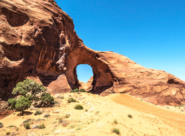 Ear Of The Wind rock formation. This is on restricted land and can only be seen on a Navajo guided tour.