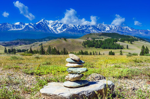 Stacking stones in mountain wilderness areas demonstrate a sense of reverence for connecting with Nature and the Universe.